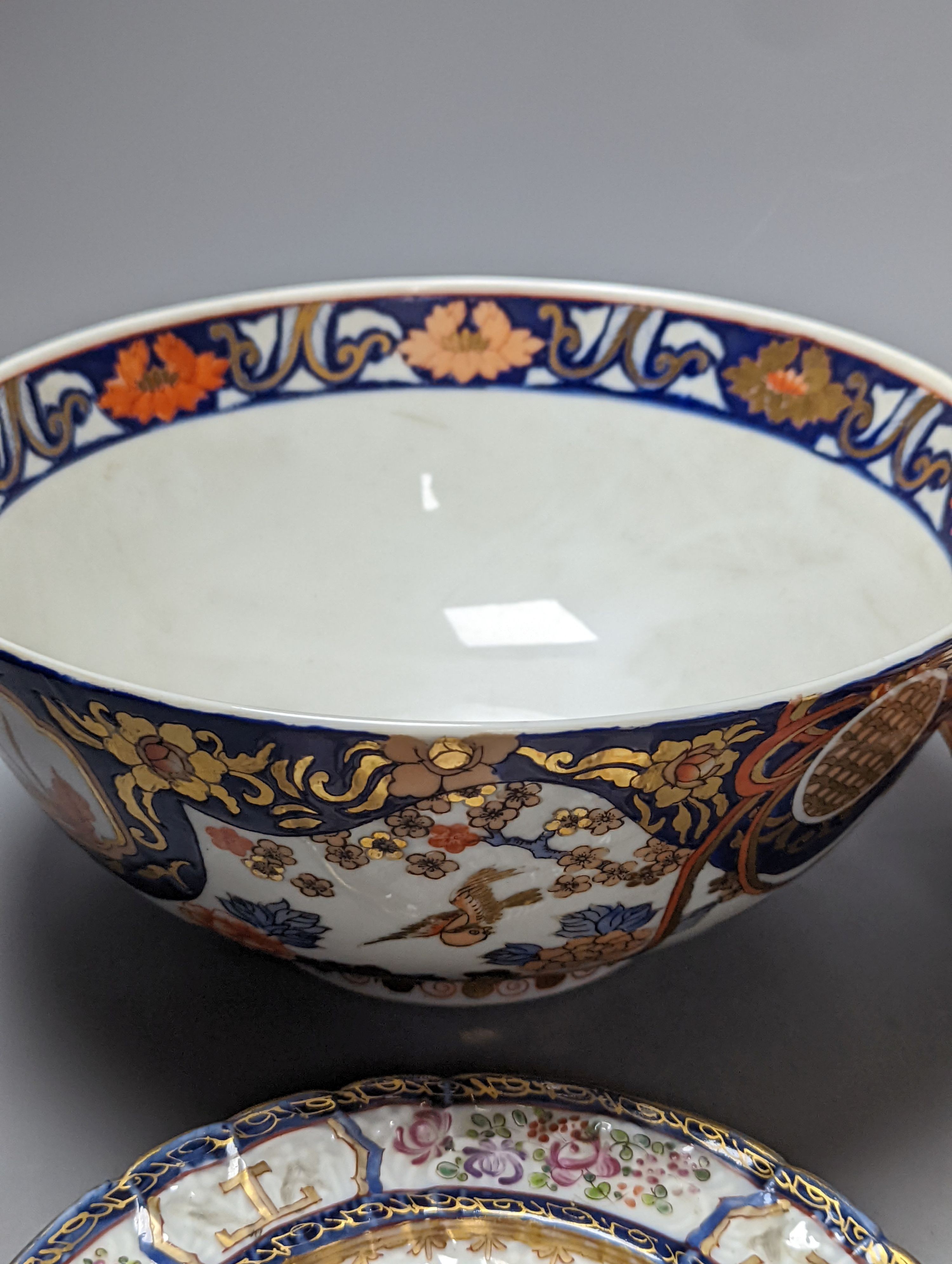 Three Masons plates, a similar platter, two armorial plates and a Japanese bowl, stoneware platter 29 cms wide.
